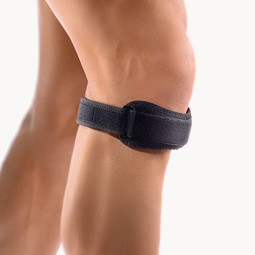 Knæ senestrop til aflastning af patella-senen. Med vendbar rem og velcrolukning.