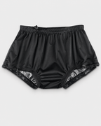 Inkontinens badeshorts til drenge med inderbuks og lækage-barriere af polyamid og polyester.