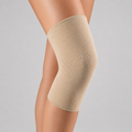 Knæ støttebind med anatomisk design til sportsskader og kompressionsbehov. Fås i beige og sort.