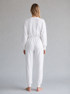 CARE bodystocking med lange ben og ærmer i Øko-Tex bomuld, fås i koboltblå, sort og hvid.