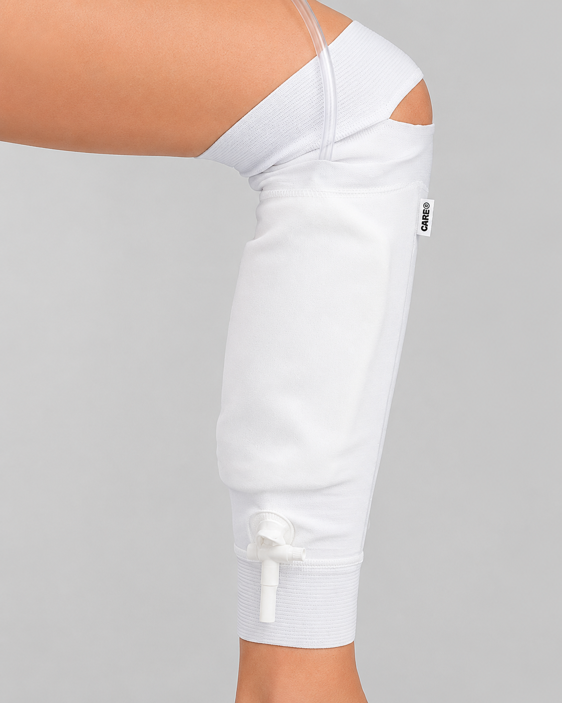 Lægfikseret urinposeholder/urinposebærer i bomuld og lycra for sikker fiksering og komfort.