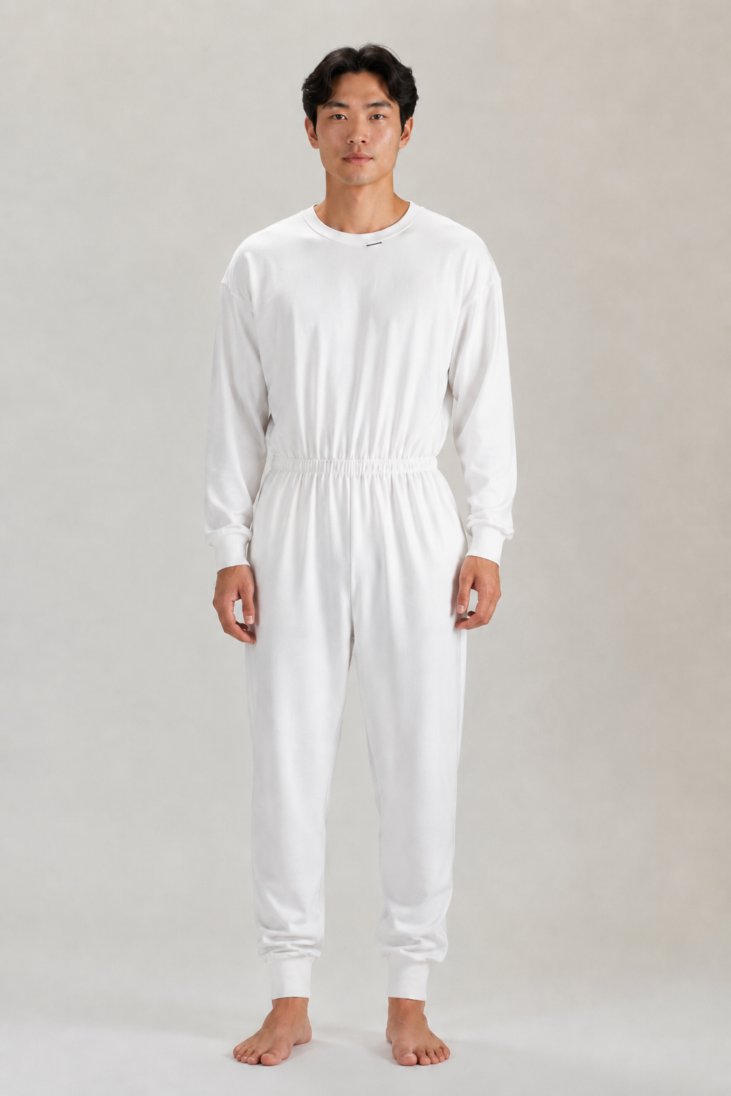 Bodystocking til voksne med lange ben, lange ærmer og lynlås i skridtet, i sort og hvid.